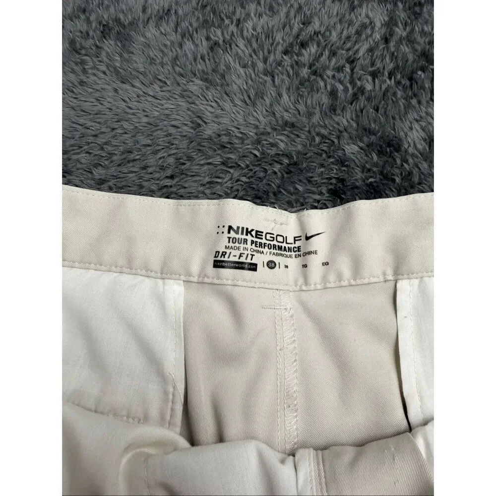 Nike Golf Tour Performance Khaki Shorts, Size Men’s 38. Color is beige.